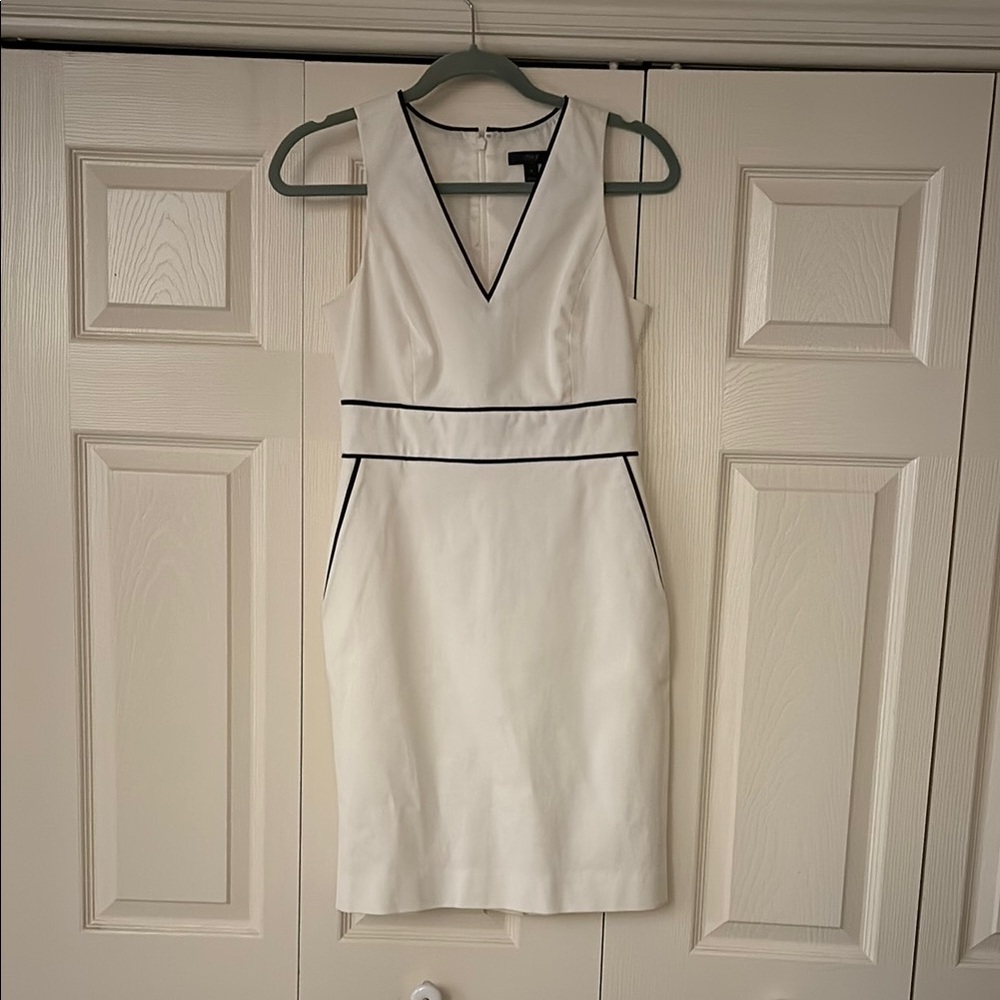 Elegant White Sleeveless with black piping